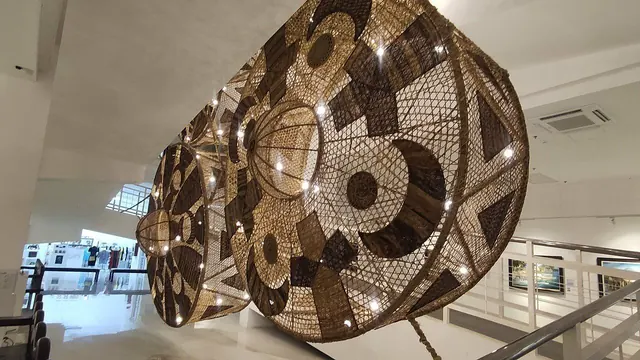 Traditional Woven Cylindrical Art Installation Display