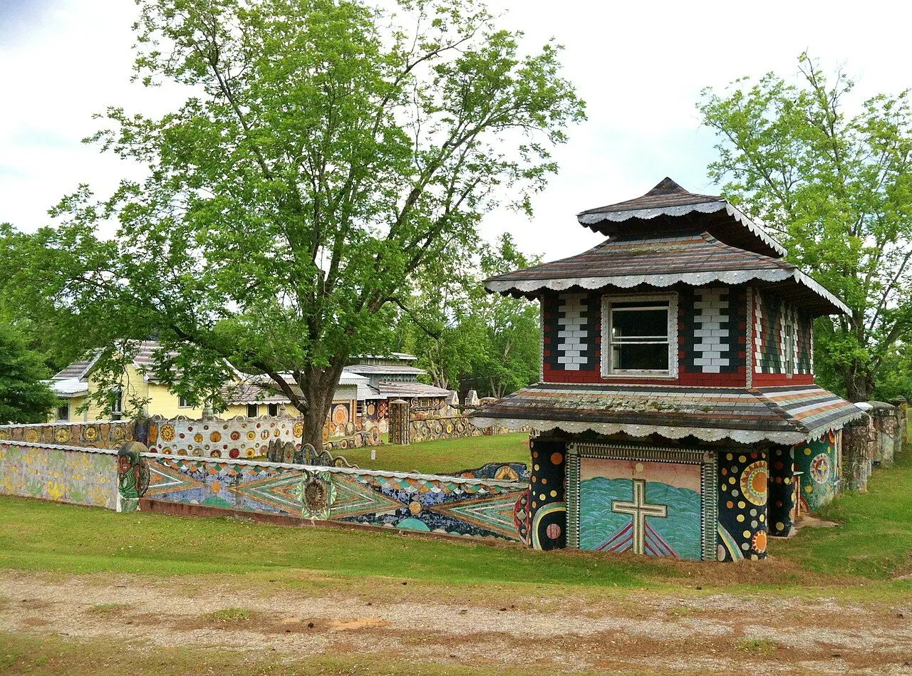 Brightly painted concrete walls and totem faces